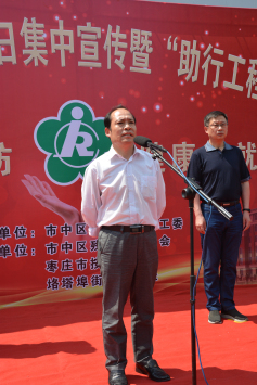 图为市残联刘希武副理事长讲话