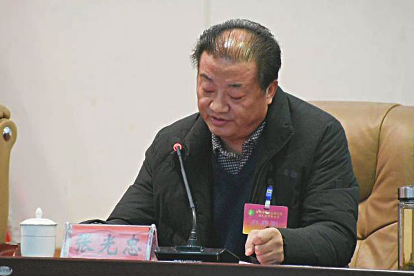 图为枣庄市残联副理事长张光忠致辞
