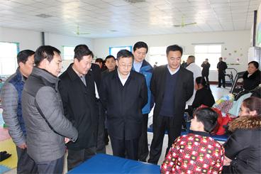 赵连冠副市长走访问慰残疾人