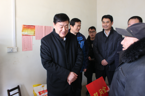 图为走访贫困残疾人家庭现场